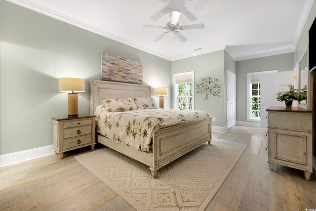 113 Trotter Trl, Georgetown, SC 29440 - bedroom featuring light wood-style flooring, baseboards, crown molding, and a ceiling fan