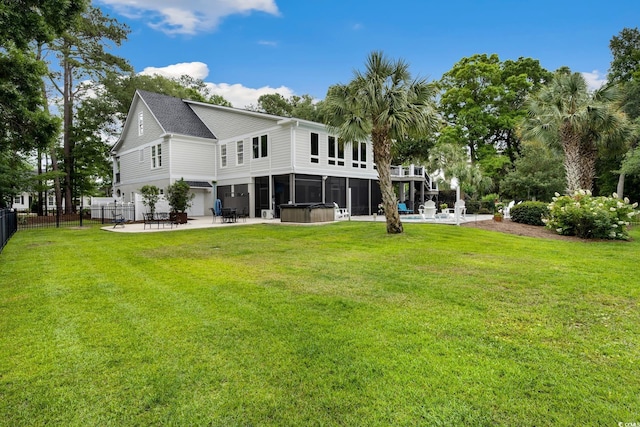 113 Trotter Trl, Georgetown, SC 29440 - back of property with a patio area, a sunroom, and a hot tub