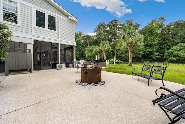 113 Trotter Trl, Georgetown, SC 29440 - view of patio featuring a sunroom, a hot tub, and view of wooded area