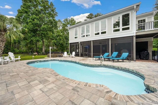 113 Trotter Trl, Georgetown, SC 29440 - swimming pool with a hot tub, a sunroom, a patio area, a grill, and ceiling fan