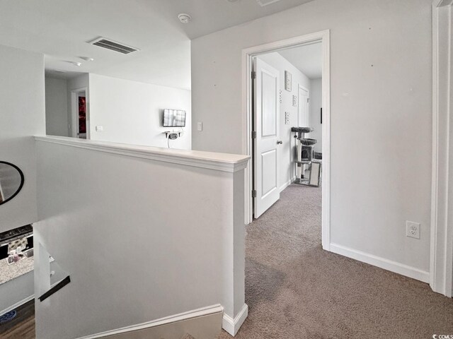 2230 Ainsley Dr, Little River, SC 29566 - hallway featuring carpet floors and an upstairs landing