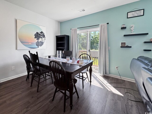 2230 Ainsley Dr, Little River, SC 29566 - dining space with wood finished floors and baseboards