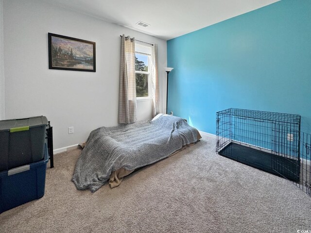 2230 Ainsley Dr, Little River, SC 29566 - carpeted bedroom featuring baseboards