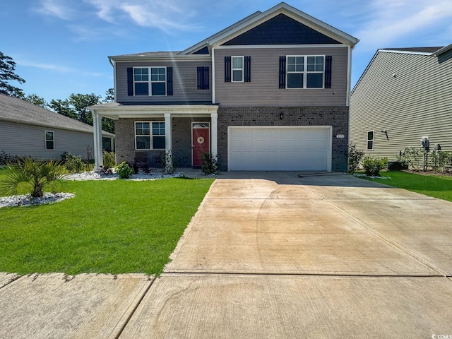 2230 Ainsley Dr, Little River, SC 29566 - view of front of house with brick siding, a front yard, driveway, an attached garage, and covered porch