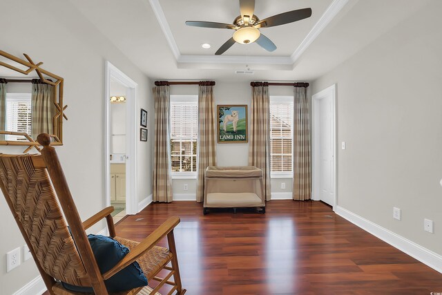 92 High Hammock Way, Pawleys Island, SC 29585 - living area featuring a tray ceiling, wood finished floors, a ceiling fan, ornamental molding, and baseboards