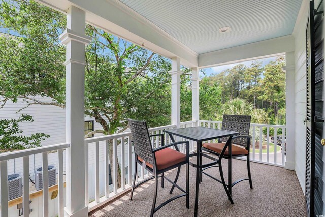 92 High Hammock Way, Pawleys Island, SC 29585 - balcony featuring cooling unit and outdoor dining area