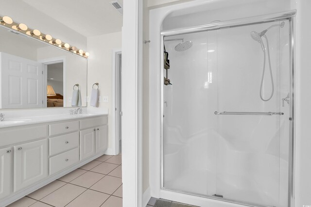 92 High Hammock Way, Pawleys Island, SC 29585 - bathroom featuring a stall shower, tile patterned flooring, and double vanity
