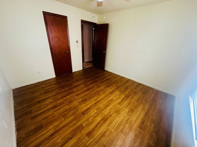 704 W Alder St, Andrews, SC 29510 - spare room with wood finished floors, a ceiling fan, and baseboards