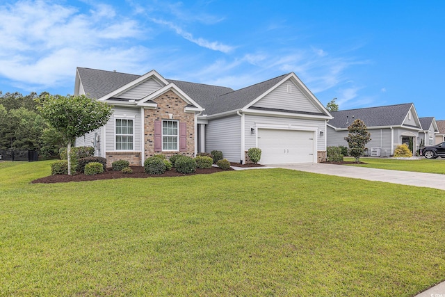 364 Palm Lakes Blvd, Little River, SC 29566 - view of front of home featuring brick siding, driveway, a front lawn, a garage, and a shingled roof