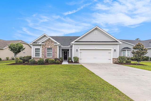 364 Palm Lakes Blvd, Little River, SC 29566 - view of front of home with brick siding, driveway, a front yard, and a garage