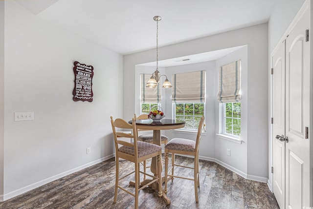 364 Palm Lakes Blvd, Little River, SC 29566 - dining area with wood finished floors, baseboards, and a chandelier
