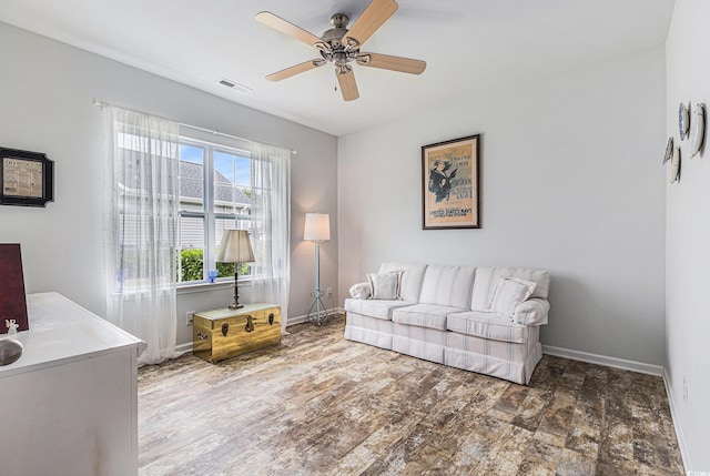 364 Palm Lakes Blvd, Little River, SC 29566 - living room featuring a ceiling fan and baseboards