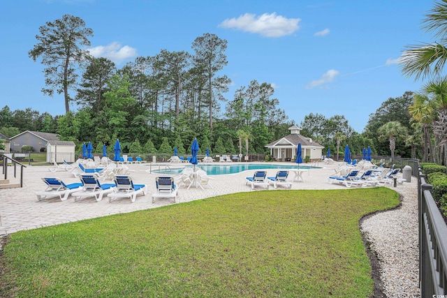 364 Palm Lakes Blvd, Little River, SC 29566 - community pool with a patio area and view of scattered trees