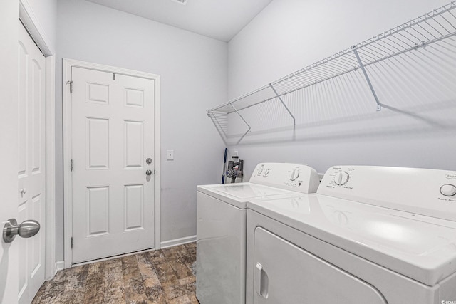 364 Palm Lakes Blvd, Little River, SC 29566 - washroom with washer and clothes dryer, baseboards, and dark wood-style floors