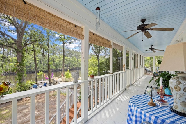 515 River Rd, Conway, SC 29526 - sunroom featuring a water view, ceiling fan, and view of scattered trees