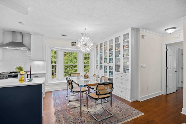 515 River Rd, Conway, SC 29526 - dining space featuring crown molding, a textured ceiling, dark wood-type flooring, baseboards, and a chandelier