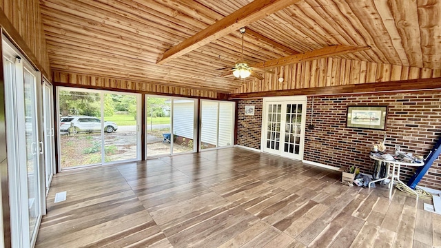 6805 Mclaurin Rd, Mullins, SC 29574 - unfurnished sunroom with vaulted ceiling, ceiling fan, and a wood stove