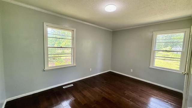 6805 Mclaurin Rd, Mullins, SC 29574 - unfurnished room with dark wood-style flooring, a textured ceiling, and crown molding