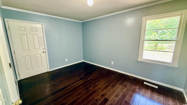 6805 Mclaurin Rd, Mullins, SC 29574 - empty room with dark wood-type flooring, plenty of natural light, crown molding, and a textured ceiling