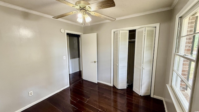 6805 Mclaurin Rd, Mullins, SC 29574 - unfurnished bedroom with hardwood / wood-style flooring, ornamental molding, a closet, and ceiling fan