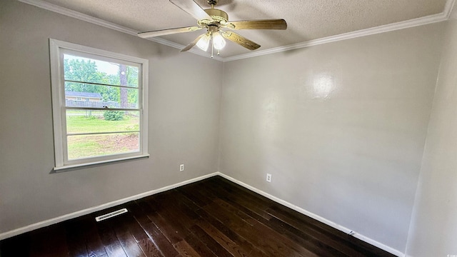 6805 Mclaurin Rd, Mullins, SC 29574 - spare room featuring dark wood-type flooring, a ceiling fan, a textured ceiling, and crown molding