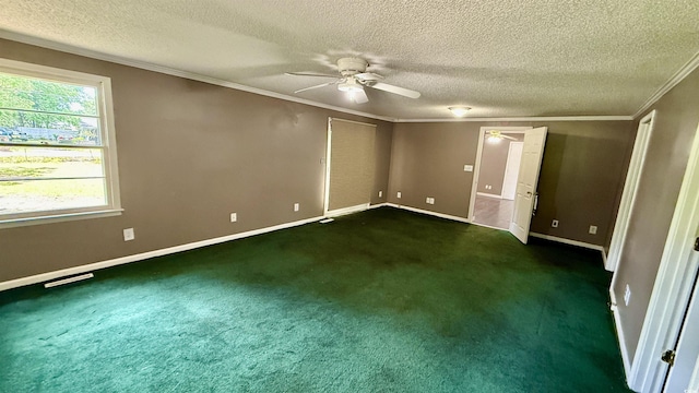 6805 Mclaurin Rd, Mullins, SC 29574 - unfurnished bedroom featuring crown molding, a textured ceiling, dark carpet, and a ceiling fan