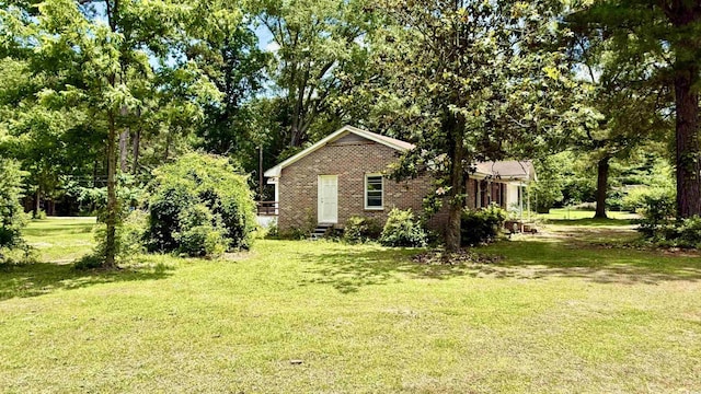 6805 Mclaurin Rd, Mullins, SC 29574 - view of green lawn featuring entry steps