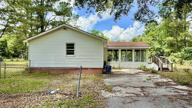 6805 Mclaurin Rd, Mullins, SC 29574 - view of property exterior featuring a sunroom