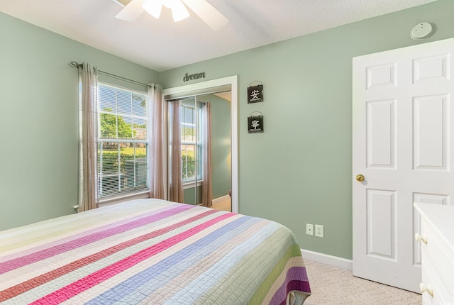 4280 Santolina Way Unit C, Murrells Inlet, SC 29576 - bedroom featuring light colored carpet, a ceiling fan, a closet, and baseboards