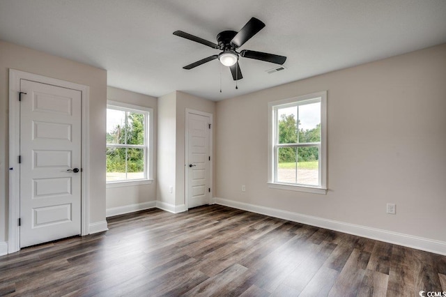 142 Temple Dr, Aynor, SC 29511 - unfurnished room featuring dark wood-style floors, baseboards, and a ceiling fan