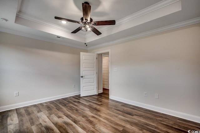 142 Temple Dr, Aynor, SC 29511 - unfurnished room featuring a raised ceiling, a ceiling fan, ornamental molding, dark wood finished floors, and baseboards