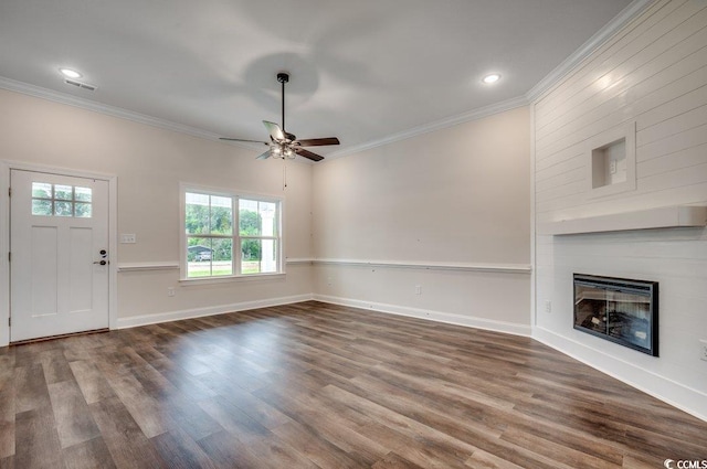 142 Temple Dr, Aynor, SC 29511 - unfurnished living room with ornamental molding, a ceiling fan, wood finished floors, a fireplace, and recessed lighting