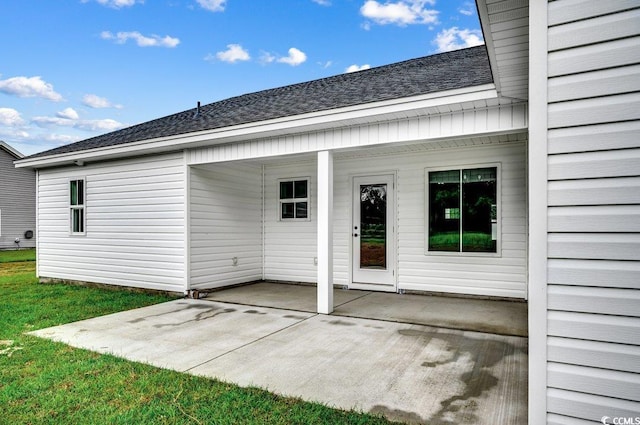 142 Temple Dr, Aynor, SC 29511 - back of house featuring a patio area and roof with shingles