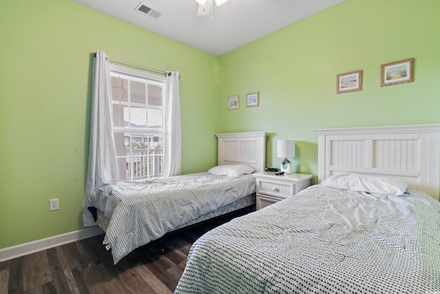5801 Oyster Catcher Dr Unit 332, North Myrtle Beach, SC 29582 - bedroom with dark wood-style flooring and baseboards
