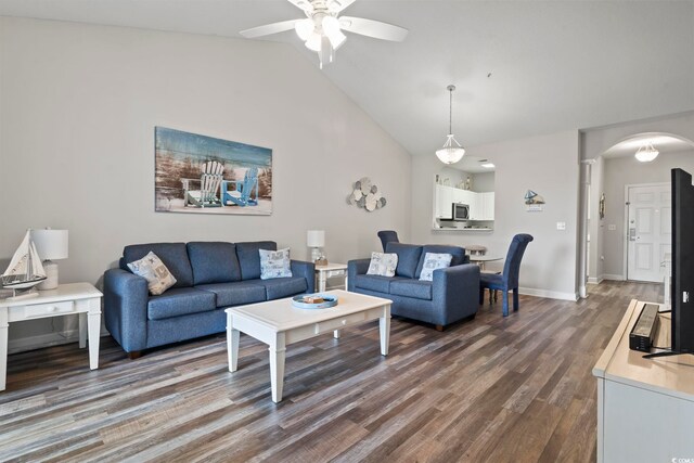 5801 Oyster Catcher Dr Unit 332, North Myrtle Beach, SC 29582 - living room with arched walkways, a ceiling fan, wood finished floors, lofted ceiling, and baseboards