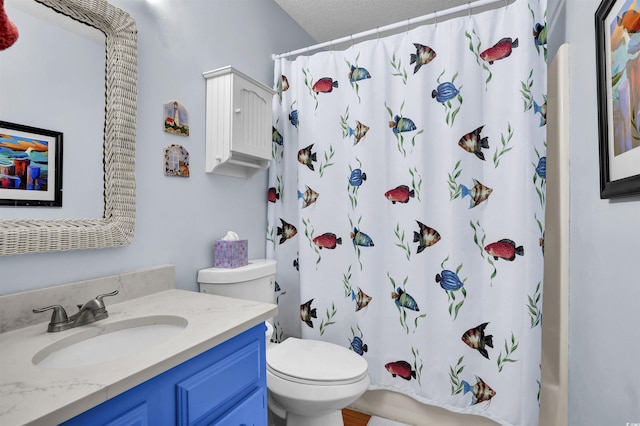 1912 Goose Creek Rd SW Unit 4302, Ocean Isle Beach, NC 28469 - full bath with toilet, vanity, and a textured ceiling