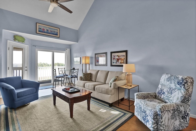1912 Goose Creek Rd SW Unit 4302, Ocean Isle Beach, NC 28469 - living area featuring high vaulted ceiling, a ceiling fan, wood finished floors, and baseboards
