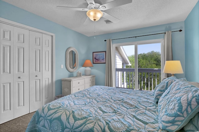 1912 Goose Creek Rd SW Unit 4302, Ocean Isle Beach, NC 28469 - carpeted bedroom featuring a textured ceiling, a closet, and a ceiling fan