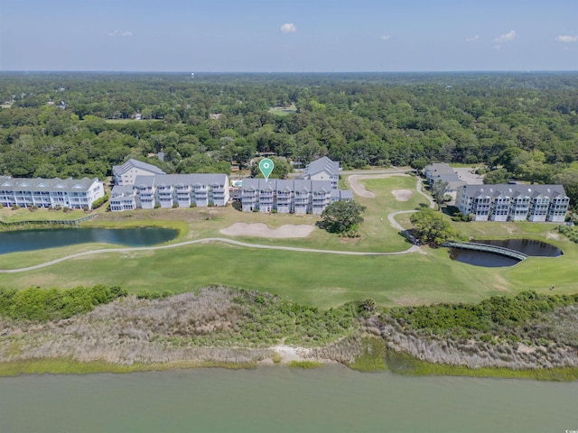 1912 Goose Creek Rd SW Unit 4302, Ocean Isle Beach, NC 28469 - aerial view of a heavily wooded area, a local golf course, a nearby body of water, and apartment complex