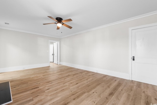 401 S Nichols St, Nichols, SC 29581 - empty room featuring light wood-style flooring, a ceiling fan, baseboards, and ornamental molding