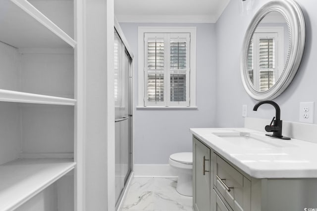 401 S Nichols St, Nichols, SC 29581 - bathroom with vanity, marble look tiles, a shower stall, toilet, and baseboards