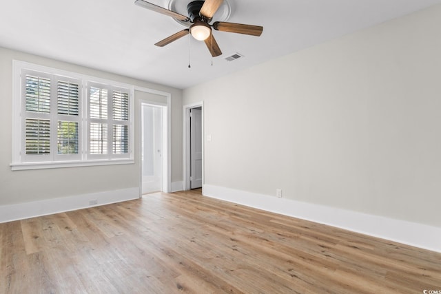 401 S Nichols St, Nichols, SC 29581 - unfurnished room featuring light wood finished floors, ceiling fan, and baseboards