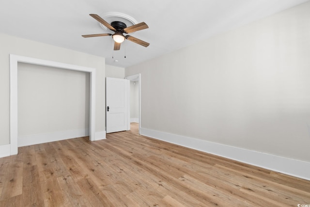 401 S Nichols St, Nichols, SC 29581 - unfurnished bedroom with light wood-type flooring, baseboards, ceiling fan, and a closet