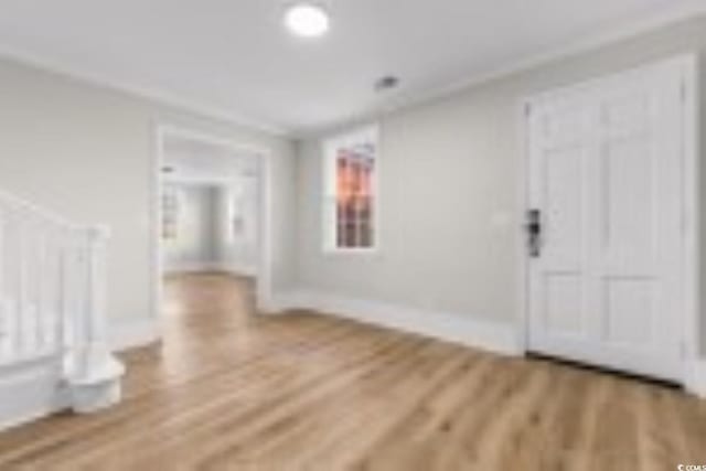 401 S Nichols St, Nichols, SC 29581 - entrance foyer with wood finished floors and baseboards