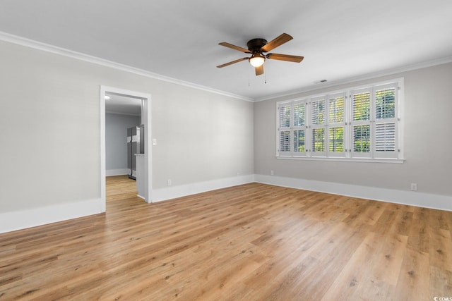 401 S Nichols St, Nichols, SC 29581 - unfurnished room featuring crown molding, ceiling fan, light wood-type flooring, and baseboards