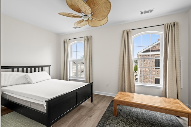 861 Murray Ave, Myrtle Beach, SC 29577 - bedroom with wood finished floors, baseboards, and a ceiling fan