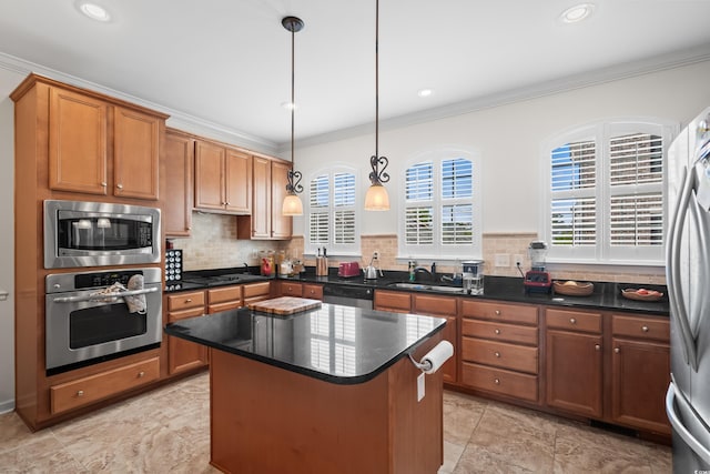 861 Murray Ave, Myrtle Beach, SC 29577 - kitchen featuring stainless steel appliances, ornamental molding, a kitchen island, tasteful backsplash, and a sink