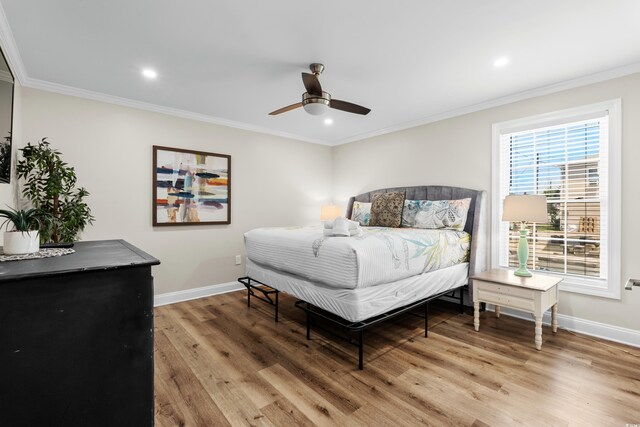 1616 S Ocean Blvd, North Myrtle Beach, SC 29582 - bedroom with baseboards, light wood-type flooring, ornamental molding, recessed lighting, and ceiling fan