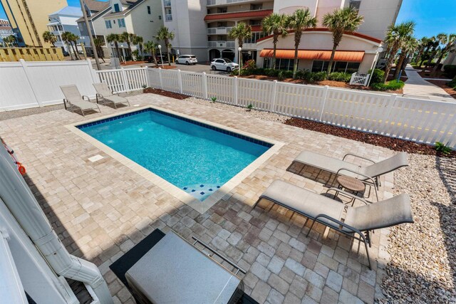 1616 S Ocean Blvd, North Myrtle Beach, SC 29582 - view of pool featuring a patio and a residential view