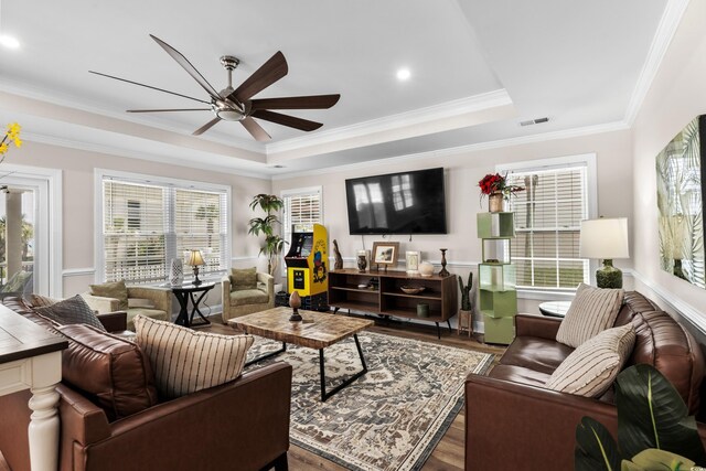 1616 S Ocean Blvd, North Myrtle Beach, SC 29582 - living area featuring a ceiling fan, wood finished floors, a tray ceiling, crown molding, and recessed lighting